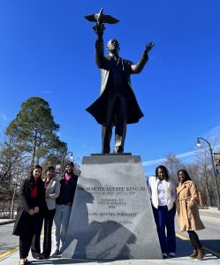 Members of Unifi's Black Employee Resource Group visit the "Hope Moving Forward" sculpture of Dr. King in downtown Atlanta.